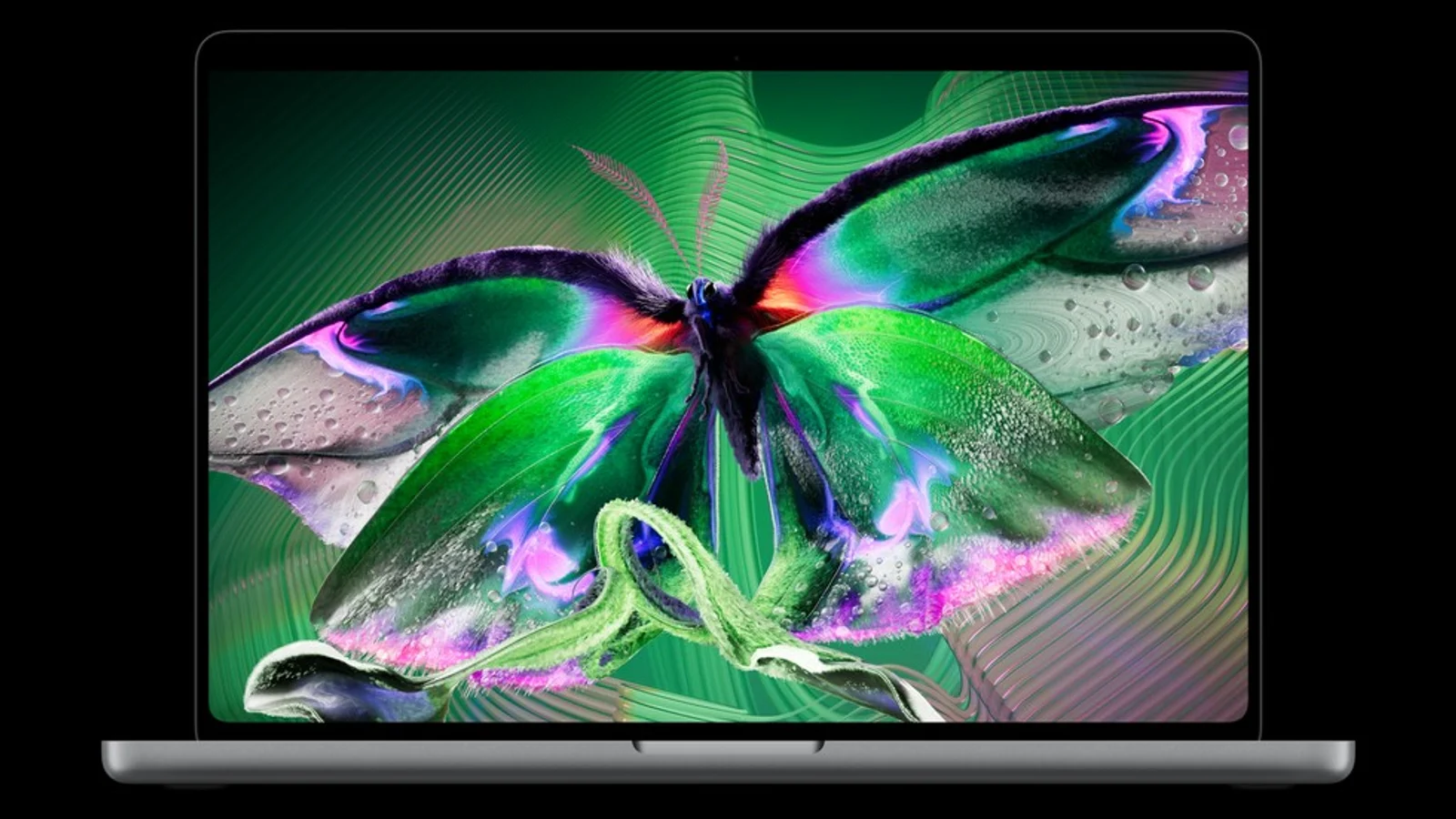 Imagen oficial de Apple: MacBook Pro abierto con una mariposa en su pantalla PROLED XDR